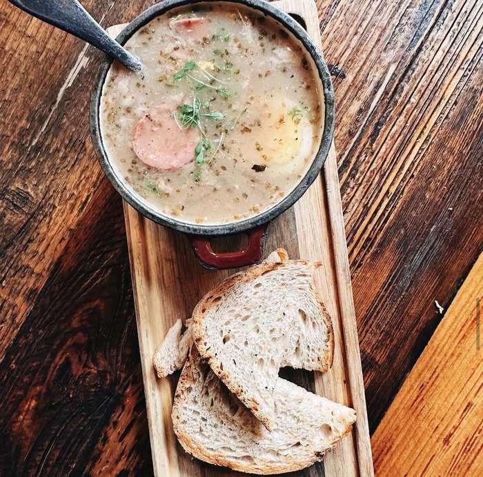 Żurek — Polish sour rye soup with kielbasa and boiled egg